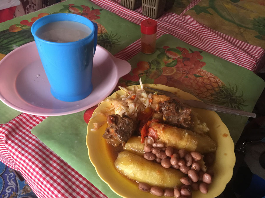 Katogo breakfast with beef and beans washed down with milky African tea, Fort Portal, Uganda