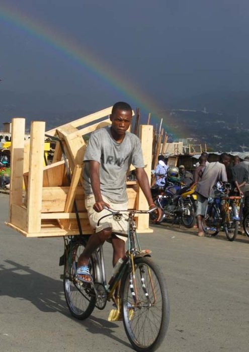 Burundi travel blog Bujumbura rainbow man on bike