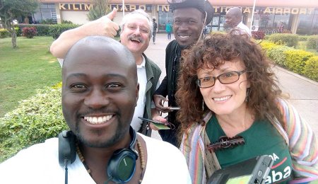 Charlotte Beauvoisin, Solomon Oleny, Wolfgang Thome, Edgar Batte. Kilimanjaro Airport