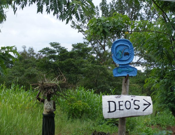 Signpost to Deo's community tourism project Ishasha