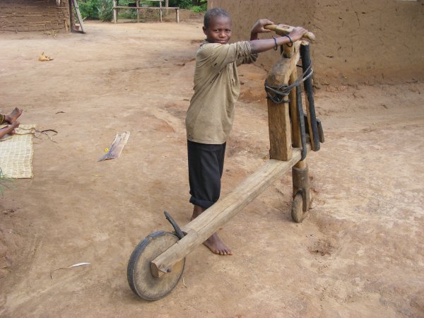 Kihihi bike or chukudu. Deo's model homestead, Ishasha