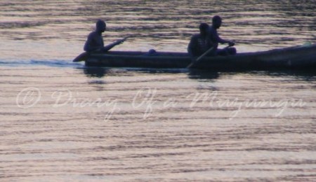 Fishermen in dugout canoe on the Kazinga Channel