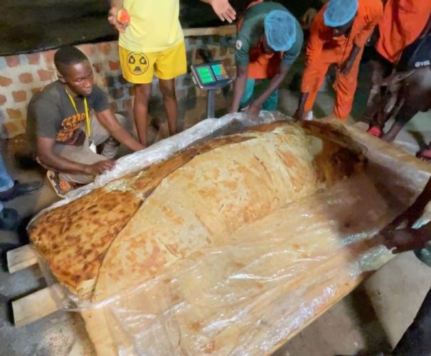 The world's largest rolex is wrapped in clingfilm.