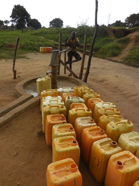 jerry cans, water pump. Oraba border, West Nile