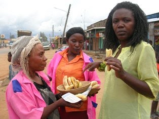 Lake Nabugabo, Uganda. Harriet buys gonja roadside