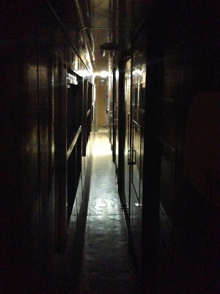 Night time view second-class carriage corridor Lunatic Express