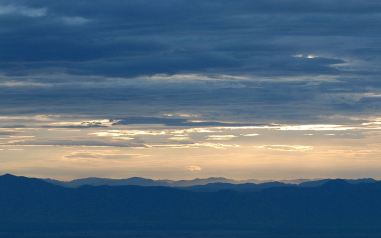 View of the Virunga Volcanoes from Nkuringo Gorilla Camp. Photo Robert Brierley