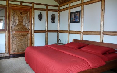 Bedroom in one of cottages at Nkuringo Gorilla Camp