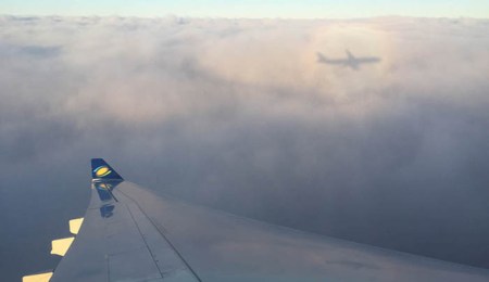 RwandAir flight aerial view wing. Diary of a Muzungu blog