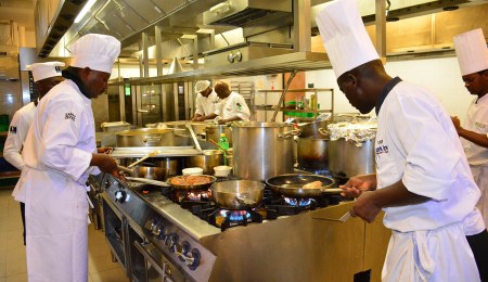 Competing chefs hard at work in the kitchens of the Kigali Marriott Hotel during the Gorilla Highlands Silverchef Competition 2018. PHOTO Vincent Mugaba