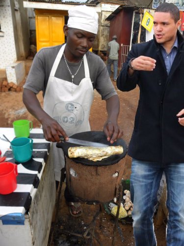 TrevorNoahVisitsUganda Wandegeya rolex